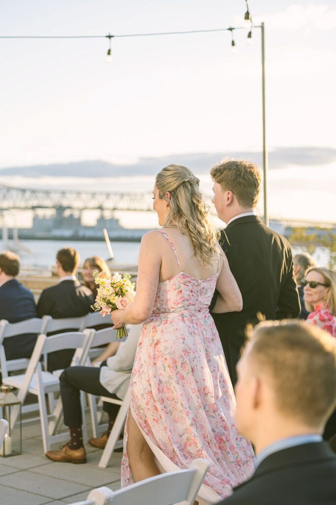 Elegant wedding guest updo with delicate crystal hair pins