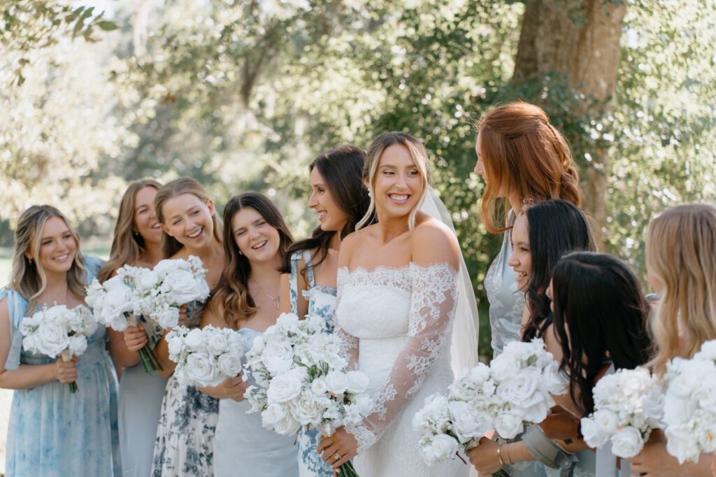 Elegant low bun wedding guest hairstyle with soft face-framing pieces