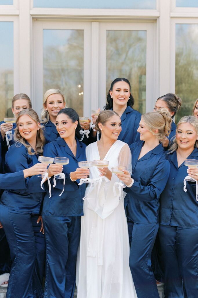 Simple twisted wedding guest updo with an elegant low bun